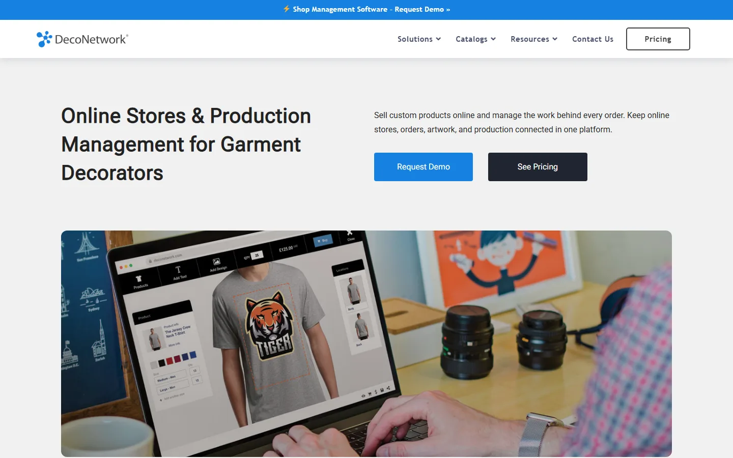 DecoNetwork's home page on 29 September 2026: the headline "Online Stores & Production Management for Garment Decorators" above a garment designer on a laptop.